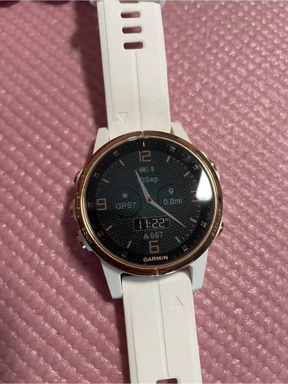 Garmin Fenix 5s Plus smartwatch in white with rose gold bezel